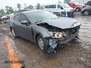 2014 Mazda 3 i Touring z VIN JM1BM1L70E1212930, wystawiony jako IAAI lot #42434348 z przebiegiem 107 209 mil mil oraz . Historia ofert i sprzedaży dostępna na DreamBid. Obrazek 1.