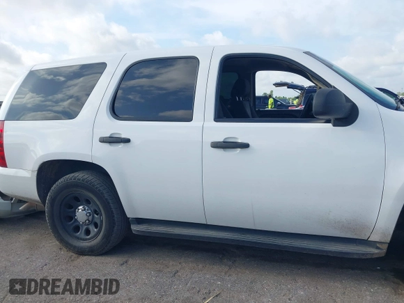 2013 Chevrolet Tahoe Commercial with VIN 1GNLC2E06DR273218, listed as a IAAI auction lot 42459013 with 181,495 mi miles and . Bid and sale history available at DreamBid. Image 14.