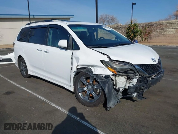 2015 Toyota Sienna SE with VIN 5TDXK3DC6FS627578, listed as a IAAI auction lot 41568684 with 124,138 mi miles and . Bid and sale history available at DreamBid. Image 1.