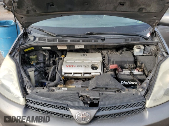 2005 Toyota Sienna XLE with VIN 5TDBA22C65S035980, listed as a Copart auction lot 54448335 with 292,194 mi miles and Salvage Title. Bid and sale history available at DreamBid. Image 12.