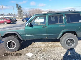 2001 Jeep Cherokee Sport with VIN 1J4FF58S41L619254, listed as a IAAI auction lot 41596384 with 180,826 mi miles and . Bid and sale history available at DreamBid. Image 14.