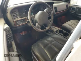 1998 Jeep Grand Cherokee Limited with VIN 1J4GZ78Y8WC285670, listed as a Copart auction lot 70213044 with 128,382 mi miles and Clean Title. Bid and sale history available at carsss.com. Image 8.