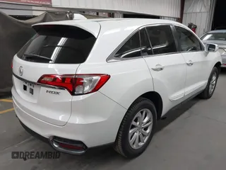 2018 Acura RDX with VIN 5J8TB3H38JL011983, listed as a IAAI auction lot 42385892 with 100,562 mi miles and . Bid and sale history available at DreamBid. Image 4.