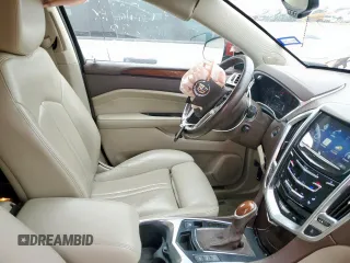 2014 Cadillac SRX Premium Collection with VIN 3GYFNGE39ES546393, listed as a Copart auction lot 57261145 with 84,258 mi miles and Salvage title. Bid and sale history available at DreamBid. Image 7.