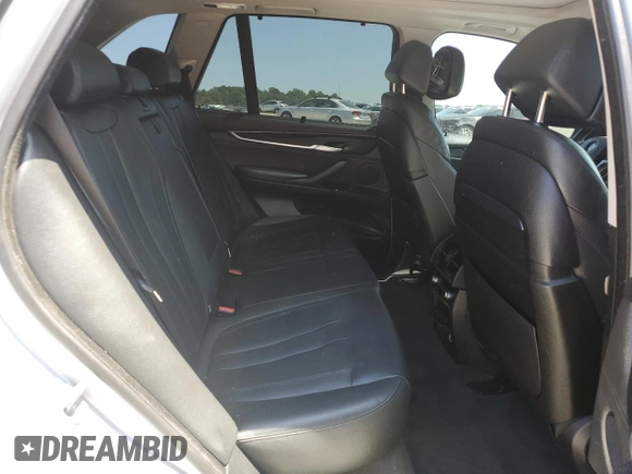2015 BMW X5 xDrive35i z VIN 5UXKR0C52F0P12247, wystawiony jako Copart lot #54955465 z przebiegiem 87 315 mil mil oraz Szkoda całkowita • Salvage title. Historia ofert i sprzedaży dostępna na DreamBid. Obrazek 11.