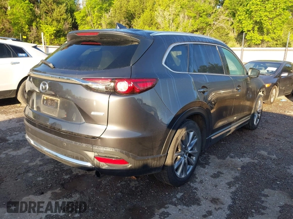 2018 Mazda CX-9 Grand Touring with VIN JM3TCBDY3J0231936, listed as a IAAI auction lot 42159391 with 105,125 mi miles and . Bid and sale history available at DreamBid. Image 4.