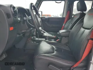 2017 Jeep Wrangler Unlimited Rubicon z VIN 1C4HJWFG6HL692928, wystawiony jako Copart lot #60049775 z przebiegiem 145 033 mil mil oraz Nie do naprawy • Non repairable. Historia ofert i sprzedaży dostępna na DreamBid. Obrazek 7.