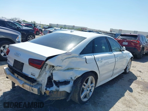 2016 Audi A6 2.0T Premium Plus with VIN WAUGFAFC4GN045229, listed as a IAAI auction lot 41974532 with 122,585 mi miles. Bid and sale history available at carsss.com. Image 4.