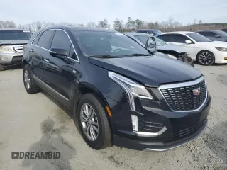 2023 Cadillac XT5 FWD Premium Luxury z VIN 1GYKNCRS6PZ145494, wystawiony jako Copart lot #45475375 z przebiegiem 48 339 mil mil oraz Szkoda całkowita • Salvage title. Historia ofert i sprzedaży dostępna na DreamBid. Obrazek 4.