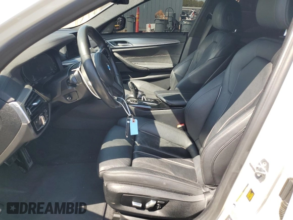 2020 BMW 5 Series 530e with VIN WBAJA9C03LCD28842, listed as a Copart auction lot 69901984 with 63,036 mi miles and Salvage Title. Bid and sale history available at DreamBid. Image 7.