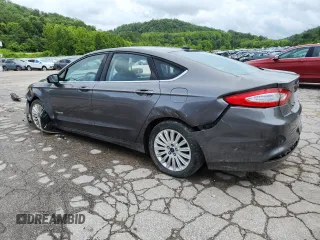 2013 Ford Fusion SE Hybrid with VIN 3FA6P0LU2DR329816, listed as a Copart auction lot 64308255 with 217,157 mi miles and Salvage title. Bid and sale history available at DreamBid. Image 2.