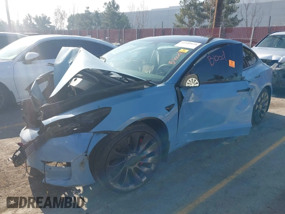 2022 Tesla Model 3 Performance with VIN 5YJ3E1EC1NF144236, listed as a IAAI auction lot 41189644 with Not Provided miles. Bid and sale history available at carsss.com. Image 19.
