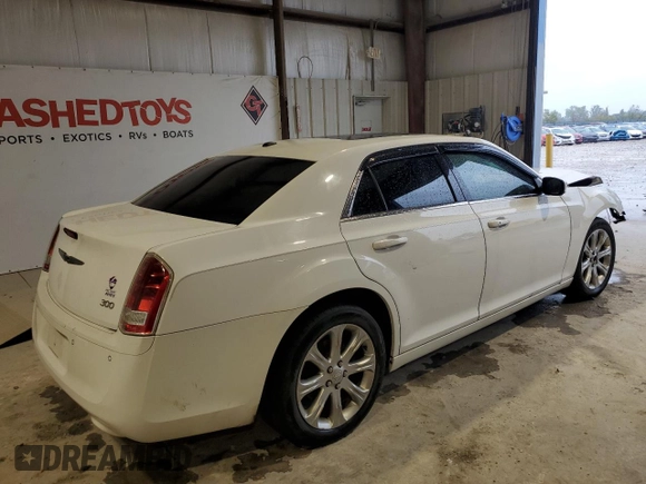 2013 Chrysler 300 with VIN 2C3CCAGGXDH590162, listed as a Copart auction lot 73473774 with 146,486 mi miles and Salvage Title. Bid and sale history available at carsss.com. Image 3.