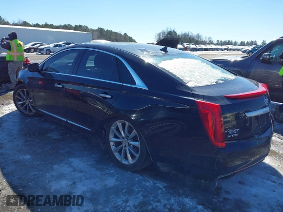 2013 Cadillac XTS Luxury with VIN 2G61P5S33D9101486, listed as a IAAI auction lot 41629349 with 141,050 mi miles. Bid and sale history available at carsss.com. Image 3.