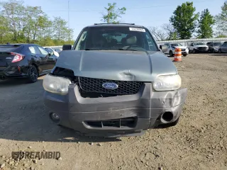 2005 Ford Escape Hybrid with VIN 1FMCU96HX5KC45835, listed as a Copart auction lot 55238065 with 223,769 mi miles and Salvage title. Bid and sale history available at DreamBid. Image 5.