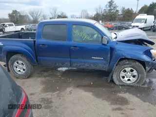 2014 Toyota Tacoma with VIN 3TMLU4EN0EM147243, listed as a IAAI auction lot 41684902 with 308,167 mi miles. Bid and sale history available at carsss.com. Image 12.