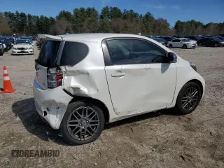 2012 Scion iQ with VIN JTNJJXB03CJ011933, listed as a Copart auction lot 52923385 with 137,836 mi miles and Clean Title. Bid and sale history available at carsss.com. Image 3.