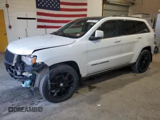 2015 Jeep Grand Cherokee Summit with VIN 1C4RJFJG1FC226591, listed as a Copart auction lot 52926115 with 130,803 mi miles and Salvage Title. Bid and sale history available at DreamBid. Image 1.
