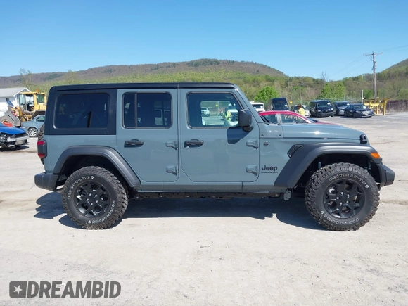 2024 Jeep Wrangler Sport S with VIN 1C4PJXDN2RW351741, listed as a IAAI auction lot 42122651 with 4,241 mi miles and . Bid and sale history available at DreamBid. Image 14.