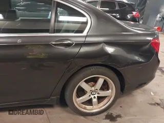 2011 BMW 7 Series 750Li xDrive with VIN WBAKC8C56BC433083, listed as a IAAI auction lot 42523890 with 120,977 mi miles and . Bid and sale history available at DreamBid. Image 6.