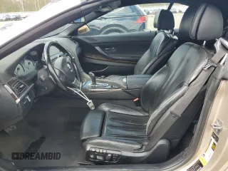 2012 BMW 6 Series 650i z VIN WBALZ3C52CC397545, wystawiony jako Copart lot #55976625 z przebiegiem 147 352 mil mil oraz Tytuł czysty. Historia ofert i sprzedaży dostępna na DreamBid. Obrazek 7.
