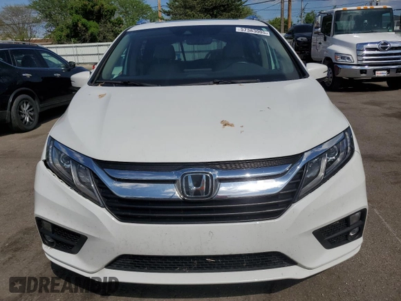 2020 Honda Odyssey EX-L z VIN 5FNRL6H79LB040523, wystawiony jako Copart lot #57383005 z przebiegiem 105 754 mil mil oraz Szkoda całkowita • Salvage title. Historia ofert i sprzedaży dostępna na DreamBid. Obrazek 5.