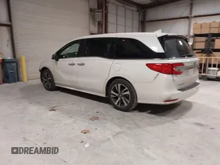 2018 Honda Odyssey Elite with VIN 5FNRL6H94JB034739, listed as a IAAI auction lot 41242506 with 96,982 mi miles and . Bid and sale history available at DreamBid. Image 3.