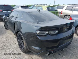 2019 Chevrolet Camaro 1LT z VIN 1G1FA1RX1K0127249, wystawiony jako IAAI lot #42240323 z przebiegiem 69 945 mil mil oraz . Historia ofert i sprzedaży dostępna na DreamBid. Obrazek 3.