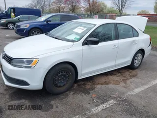 2014 Volkswagen Jetta Sedan S with VIN 3VW2K7AJ5EM329328, listed as a IAAI auction lot 41995084 with 72,409 mi miles. Bid and sale history available at carsss.com. Image 2.