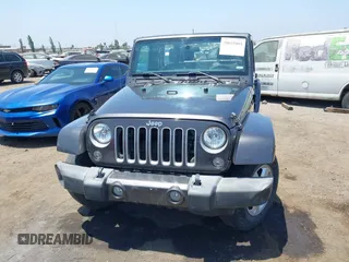 2016 Jeep Wrangler Unlimited Sahara with VIN 1C4HJWEG2GL273507, listed as a IAAI auction lot 39855004 with 87,011 mi miles and . Bid and sale history available at DreamBid. Image 12.
