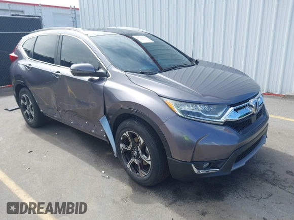 2018 Honda CR-V Touring with VIN 7FARW1H9XJE018575, listed as a IAAI auction lot 41747192 with 83,699 mi miles and . Bid and sale history available at carsss.com. Image 1.