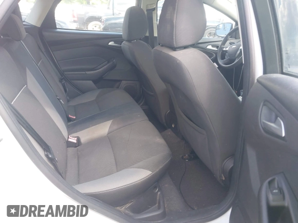 2014 Ford Focus SE z VIN 1FADP3K29EL387351, wystawiony jako IAAI lot #42167782 z przebiegiem 120 878 mil mil oraz . Historia ofert i sprzedaży dostępna na DreamBid. Obrazek 8.