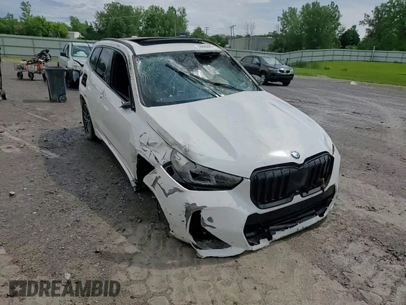2023 BMW X1 xDrive28i with VIN WBX73EF08P5X60980, listed as a Copart auction lot 59899385 with 21,975 mi miles and Salvage title. Bid and sale history available at DreamBid. Image 15.