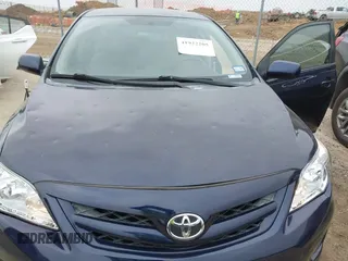 2012 Toyota Corolla L with VIN 5YFBU4EE7CP061770, listed as a IAAI auction lot 41922205 with 154,615 mi miles. Bid and sale history available at carsss.com. Image 6.