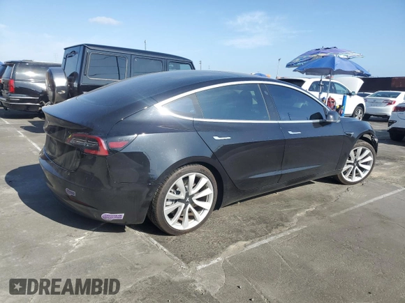 2018 Tesla Model 3 Long Range Battery z VIN 5YJ3E1EB7JF071438, wystawiony jako Copart lot #52996665 z przebiegiem 73 881 mil mil oraz Szkoda całkowita • Salvage title. Historia ofert i sprzedaży dostępna na DreamBid. Obrazek 3.