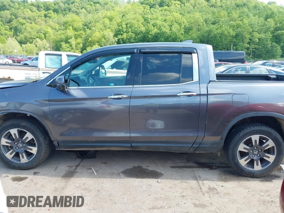 2018 Honda Ridgeline RTL-E with VIN 5FPYK3F74JB004162, listed as a IAAI auction lot 42180687 with 160,805 mi miles and . Bid and sale history available at DreamBid. Image 15.