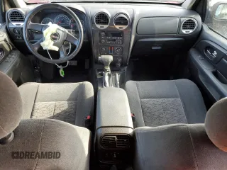 2006 GMC Envoy SLT with VIN 1GKDS13S762259102, listed as a Copart auction lot 79233224 with 125,404 mi miles and Salvage Title. Bid and sale history available at carsss.com. Image 8.