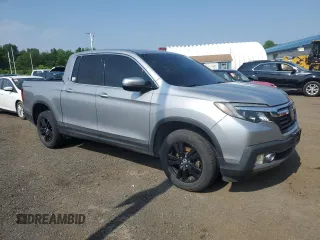 2018 Honda Ridgeline RTL-E with VIN 5FPYK3F77JB014975, listed as a Copart auction lot 59798125 with 124,361 mi miles and Clean title. Bid and sale history available at DreamBid. Image 4.