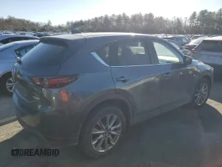 2021 Mazda CX-5 Grand Touring with VIN JM3KFBDM9M0490239, listed as a Copart auction lot 43306975 with 47,010 mi miles and Salvage Title. Bid and sale history available at carsss.com. Image 3.