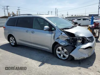 2014 Toyota Sienna LE AAS with VIN 5TDKK3DC1ES504232, listed as a Copart auction lot 54169005 with 103,724 mi miles and Salvage Title. Bid and sale history available at DreamBid. Image 4.