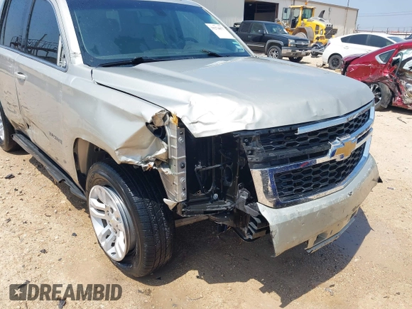 2015 Chevrolet Tahoe LS with VIN 1GNSCAKC9FR294832, listed as a IAAI auction lot 39274877 with 126,932 mi miles and . Bid and sale history available at DreamBid. Image 6.