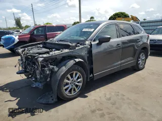 2016 Mazda CX-9 Touring with VIN JM3TCACY3G0115334, listed as a Copart auction lot 64129265 with 156,674 mi miles and Clean title. Bid and sale history available at DreamBid. Image 1.