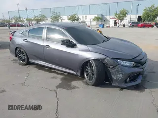2020 Honda Civic Si z VIN 2HGFC1E51LH705001, wystawiony jako IAAI lot #42049738 z przebiegiem 55 715 mil mil oraz . Historia ofert i sprzedaży dostępna na DreamBid. Obrazek 1.