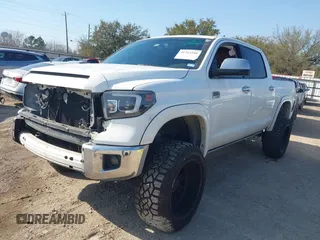 2015 Toyota Tundra Platinum z VIN 5TFGY5F15FX176935, wystawiony jako IAAI lot #41763346 z przebiegiem 150 110 mil mil oraz . Historia ofert i sprzedaży dostępna na DreamBid. Obrazek 18.