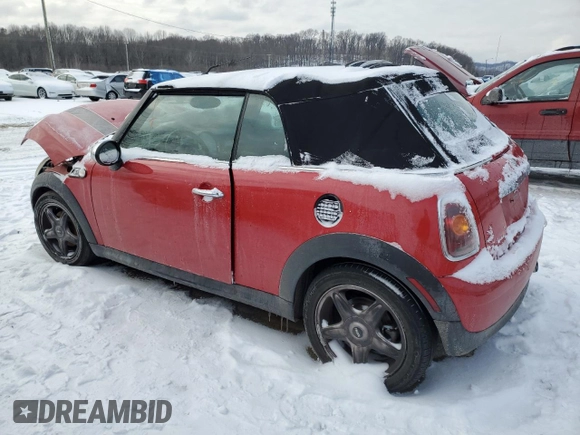 2010 MINI Convertible with VIN WMWMR3C57ATU97979, listed as a Copart auction lot 45903855 with 154,614 mi miles and Salvage Title. Bid and sale history available at DreamBid. Image 2.