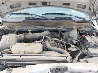 2002 Dodge 1500 with VIN 1D7HU18Z82S576903, listed as a IAAI auction lot 42125464 with 215,479 mi miles. Bid and sale history available at carsss.com. Image 10.
