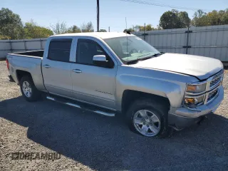 2015 Chevrolet Silverado 1500 LT with VIN 3GCUKREH2FG242873, listed as a Copart auction lot 73356814 with 131,045 mi miles and Salvage Title. Bid and sale history available at DreamBid. Image 4.