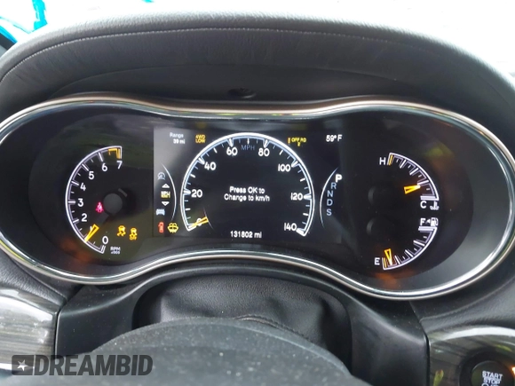 2014 Jeep Grand Cherokee Overland with VIN 1C4RJFCG9EC460165, listed as a IAAI auction lot 42092137 with 131,802 mi miles and . Bid and sale history available at DreamBid. Image 7.