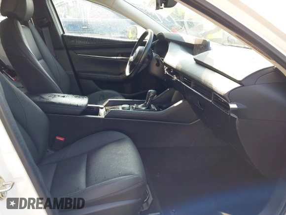 2022 Mazda 3 Carbon Edition with VIN 3MZBPACL0NM318573, listed as a IAAI auction lot 42403393 with 8,762 mi miles and . Bid and sale history available at DreamBid. Image 5.