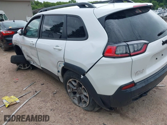 2020 Jeep Cherokee Latitude with VIN 1C4PJMCXXLD578180, listed as a IAAI auction lot 42438023 with 82,845 mi miles and . Bid and sale history available at DreamBid. Image 3.